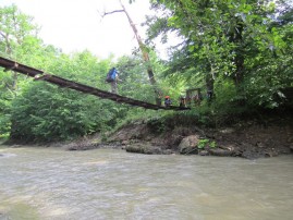 The bridge over the river in the mountains